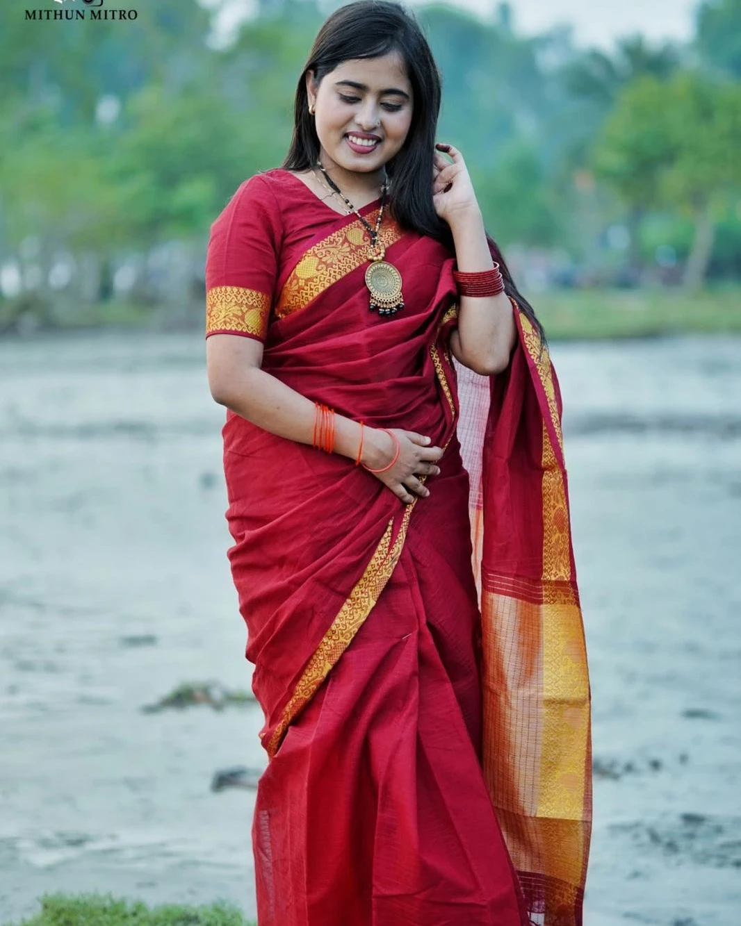Elegant Maroon Half Silk Nakshi Paar Saree