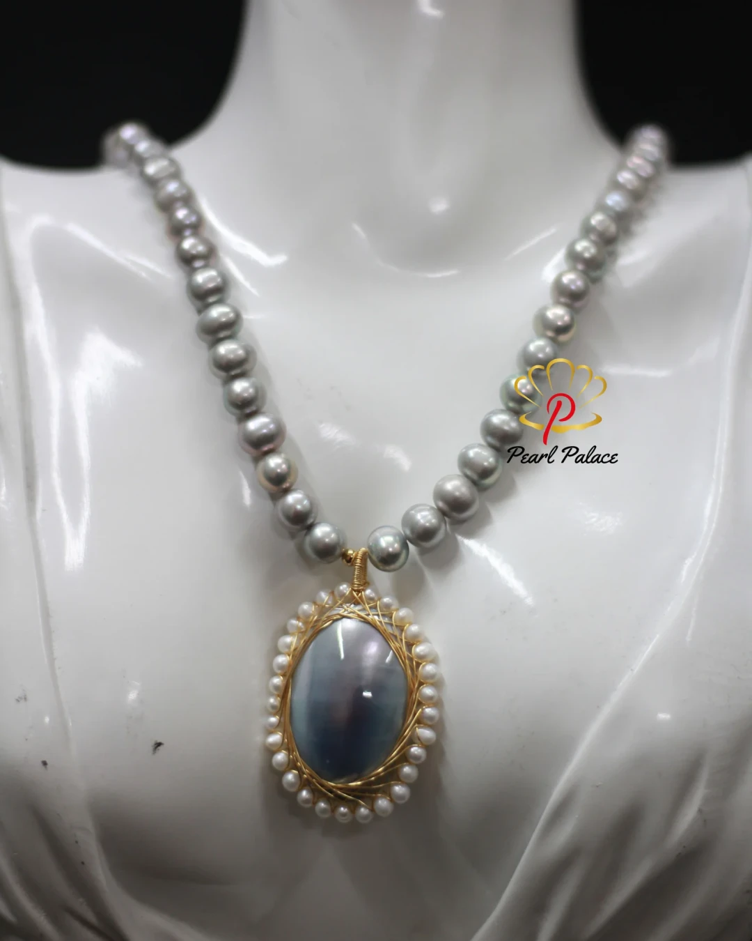 Silver Pearl Necklace with Silver Shell Pearl Pendant.
